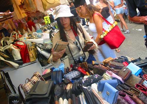 Manda picks out a purse in Iraklio market.