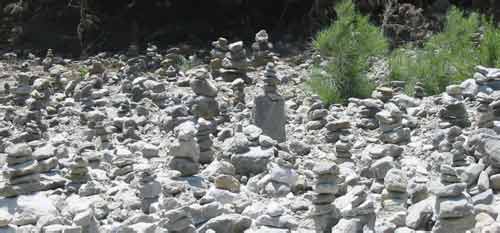 Little piles of rocks left as offerings to the four winds. Or something like that.