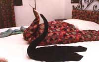 Bedsheets folded to look like swans