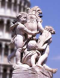 Cherub Statue in foreground of Leaning Tower