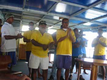 Crew of MV Taralala sign their goodbyes to guests