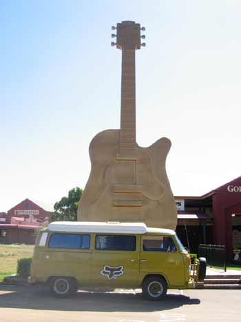 Ethel in front of the Giant Golden Guitar, Tamworth [parked directly over the spot that says No Parking,naughty].