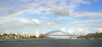 Rainbow over Sydney Harbour Bridge.