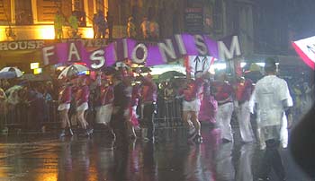 Men in pink tops and white fluffy ballerina skirts - it has to be Sydney's Gay and Lesbian Mardi Gras Parade.