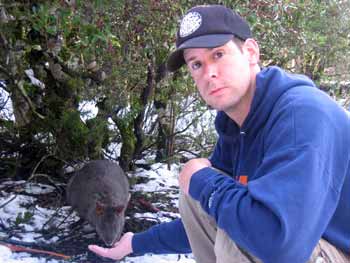 Ian feeding a wallaby raisins.