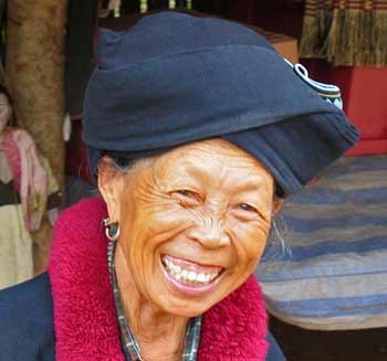 The crazy smiling Yao woman.
