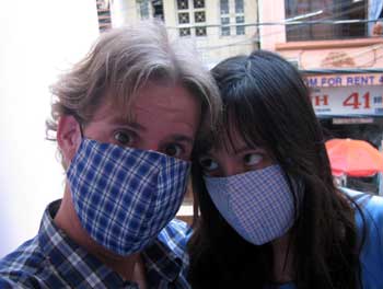 Ian and Manda wearing smog masks