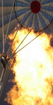 Decorative image: flames shooting into the inside of a hot-air balloon